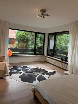 Ein Bett oder Betten in einem Zimmer der Unterkunft Oli Munich suburb Apartment Garden Balcony