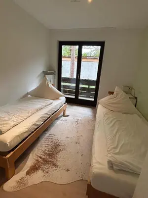 Ein Bett oder Betten in einem Zimmer der Unterkunft Oli Munich suburb Apartment Garden Balcony