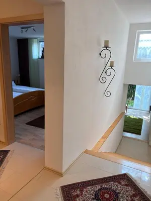 Ein Bett oder Betten in einem Zimmer der Unterkunft Traumhafte Gartenwohnung