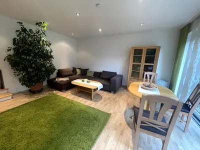 Ein Sitzbereich in der Unterkunft Traumhafte Gartenwohnung