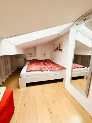 Ein Bett oder Betten in einem Zimmer der Unterkunft Ferienwohnung Spitzenblick Gentes