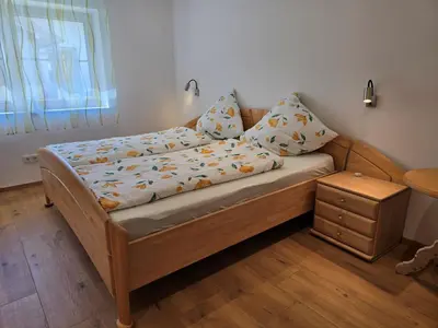 Ein Bett oder Betten in einem Zimmer der Unterkunft Ferienwohnung am Eichberg