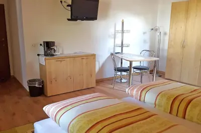 Ein Bett oder Betten in einem Zimmer der Unterkunft Bauernhof Daurerhof