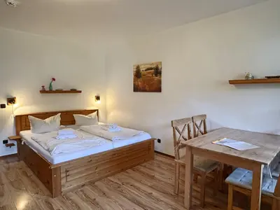 Ein Bett oder Betten in einem Zimmer der Unterkunft Gschwendtnerhof App4 Pätzig