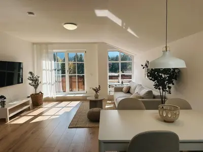 TV/Unterhaltungsangebot in der Unterkunft Flow Living I Stilvolles Apartment am Tegernsee I Bergblick I 5 Min zum See