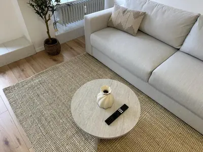 Ein Sitzbereich in der Unterkunft Flow Living I Stilvolles Apartment am Tegernsee I Bergblick I 5 Min zum See