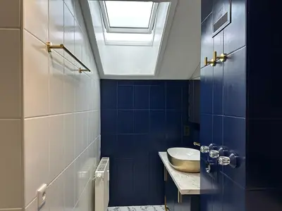 Ein Badezimmer in der Unterkunft Flow Living I Stilvolles Apartment am Tegernsee I Bergblick I 5 Min zum See