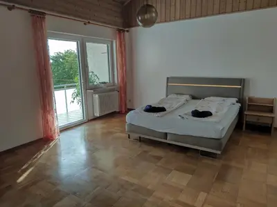 Ein Bett oder Betten in einem Zimmer der Unterkunft La Datcha