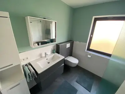 Ein Badezimmer in der Unterkunft Moderne 2 Zimmer Wohnung in bester Lage - ruhig, zentral, stilvoll