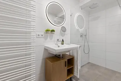 Ein Badezimmer in der Unterkunft BALANCED Münsing Apartments, vollausgestatte Ferienwohnungen Nähe Starnberger See