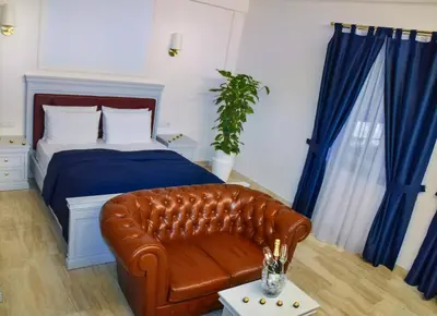 Ein Bett oder Betten in einem Zimmer der Unterkunft Grand Hotel Palladium