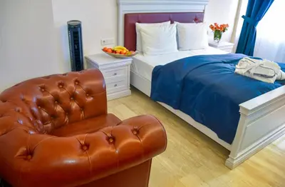 Ein Bett oder Betten in einem Zimmer der Unterkunft Grand Hotel Palladium