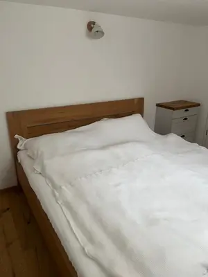Ein Bett oder Betten in einem Zimmer der Unterkunft Rufus' Bergblick