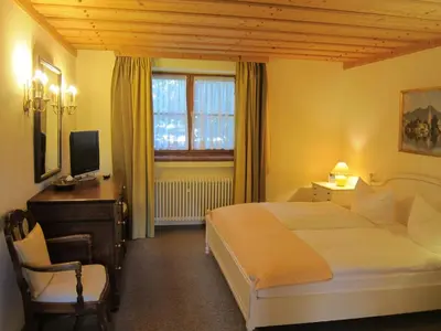 Ein Bett oder Betten in einem Zimmer der Unterkunft Ferienwohnungen Elisabeth am See
