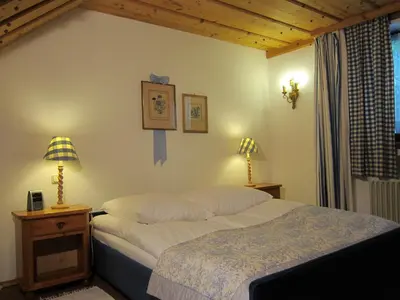Ein Bett oder Betten in einem Zimmer der Unterkunft Ferienwohnungen Elisabeth am See
