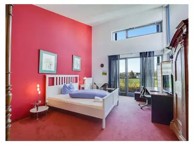 Ein Bett oder Betten in einem Zimmer der Unterkunft Holiday apartment in Munich with Wi-Fi
