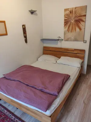 Ein Bett oder Betten in einem Zimmer der Unterkunft Charming Room in a Central Location with perfect Connectivity