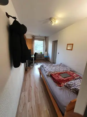 Ein Bett oder Betten in einem Zimmer der Unterkunft Charming Room in a Central Location with perfect Connectivity