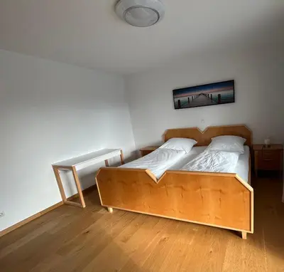 Ein Bett oder Betten in einem Zimmer der Unterkunft Tolle Ferienwohnung in Altomünster