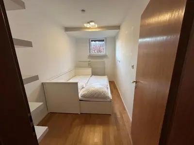 Ein Bett oder Betten in einem Zimmer der Unterkunft Tolle Ferienwohnung in Altomünster