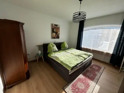 Ein Bett oder Betten in einem Zimmer der Unterkunft Bergblick