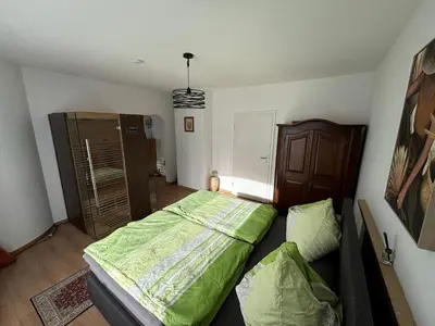 Ein Bett oder Betten in einem Zimmer der Unterkunft Bergblick
