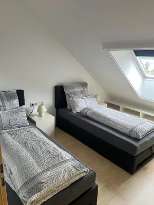 Ein Bett oder Betten in einem Zimmer der Unterkunft Hinter-Apartments West