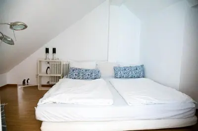 Ein Bett oder Betten in einem Zimmer der Unterkunft Hans Sachs