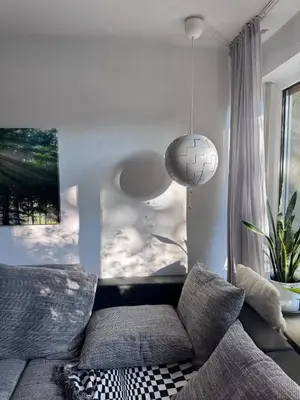 Ein Sitzbereich in der Unterkunft Zwei Zimmer im Reihenhaus