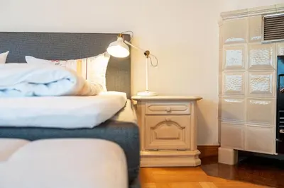 Ein Bett oder Betten in einem Zimmer der Unterkunft Ferienhaus Achendamm