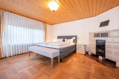Ein Bett oder Betten in einem Zimmer der Unterkunft Ferienhaus Achendamm