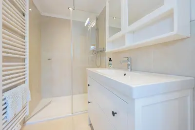 Ein Badezimmer in der Unterkunft Ferienhaus Achendamm