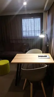 Ein Sitzbereich in der Unterkunft ARRIVEL Hotel Kirchheim - bisher Novitel