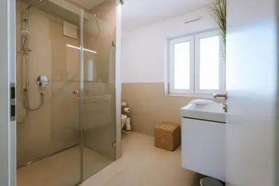 Ein Badezimmer in der Unterkunft Ferienwohnung Leopoldine Chiemgau