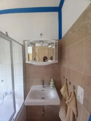 Ein Badezimmer in der Unterkunft beim Anderl