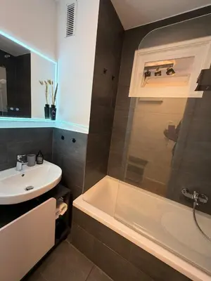 Ein Badezimmer in der Unterkunft Hochwertige GoldenKey Suite mitten in der Altstadt