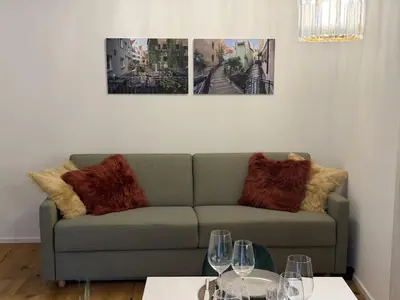 Ein Sitzbereich in der Unterkunft Hochwertige GoldenKey Suite mitten in der Altstadt