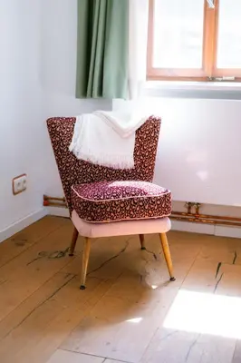 Ein Sitzbereich in der Unterkunft Ferienwohnung im Allgäu für Gruppen bis 12 Personen - ALIMA der Hof