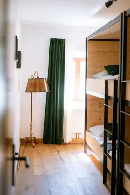 Ein Bett oder Betten in einem Zimmer der Unterkunft Ferienwohnung im Allgäu für Gruppen bis 12 Personen - ALIMA der Hof