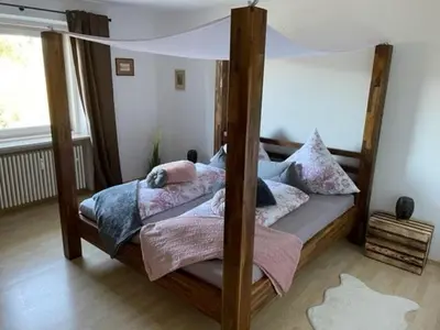 Ein Bett oder Betten in einem Zimmer der Unterkunft Sky bed and wood stove appartment