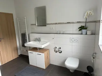 Ein Badezimmer in der Unterkunft Ferienhaus Heiß