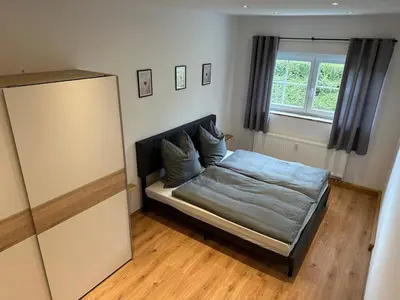 Ein Bett oder Betten in einem Zimmer der Unterkunft Ferienhaus Heiß