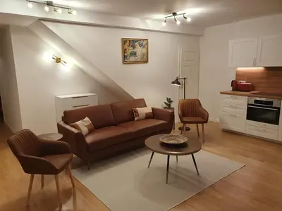 Küche/Küchenzeile in der Unterkunft 75m2 lichtdurchflutete 3 Zimmer Souterrain Wohnung in einem Neubau Villa