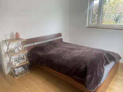 Ein Bett oder Betten in einem Zimmer der Unterkunft October