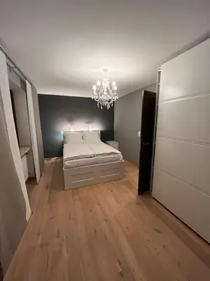 Ein Bett oder Betten in einem Zimmer der Unterkunft Wunderschöne, große Gartenwohnung mit 3 Schlafzimmern Nähe Kaufbeuren