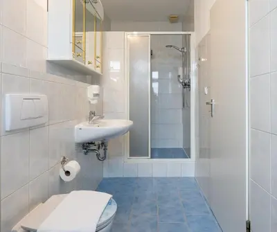 Ein Badezimmer in der Unterkunft Höllental heritage house - Alpspitzblick - 1