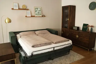 Ein Bett oder Betten in einem Zimmer der Unterkunft City Quartier 4 Traumlage Augsburg Zentrum