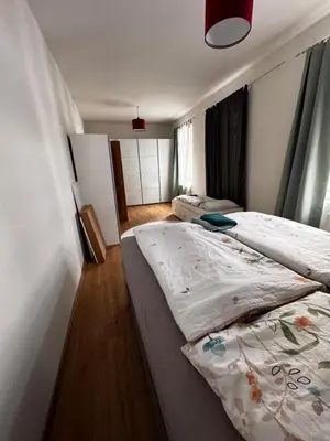 Ein Bett oder Betten in einem Zimmer der Unterkunft Aby Wohnungen
