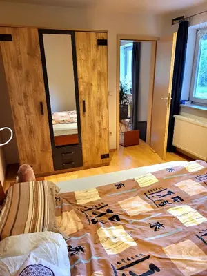 Ein Bett oder Betten in einem Zimmer der Unterkunft Die Waldmeisterei