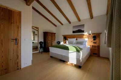 Ein Bett oder Betten in einem Zimmer der Unterkunft Ferienwohnungen Fendl